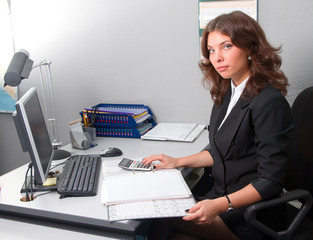 Businesswoman at her workplace.