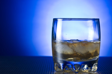 scotch whiskey in glass with ice
