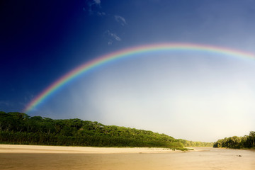 Rainbow over river