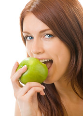 Portrait of young happy woman eating apple, isolated