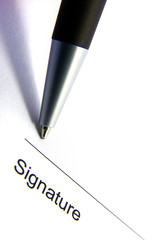 Signature and pen