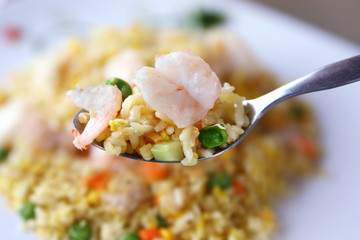 A spoonful of seafood fried rice