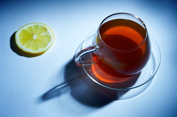 Cup of black tea with lemon