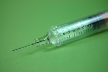 Syringe on Green