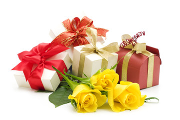 yellow roses and gift box on white background
