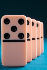 the number five in a row of five dominoes