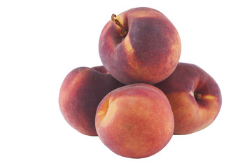 heap of ripe peaches isolated on white