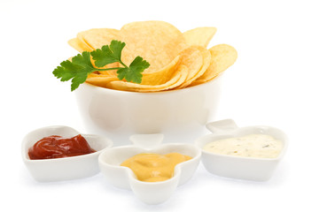 Potato chips with parsley and sauces