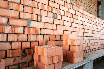 Fragment of a brick wall on building