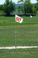 Golf driving range fifty yard marker