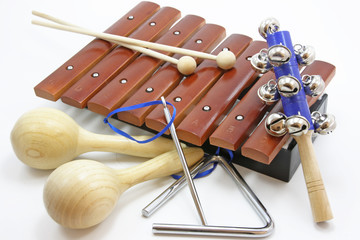 musical instruments laying on a white background