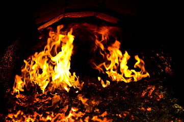 fire inside an old furnace.