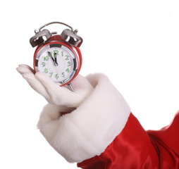 Alarm clock on palm of Santa Claus.