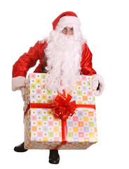 Santa Claus giving big gift box with red bow.