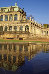 Fototapeta na wymiar Zwinger palace in Dresden with reflection in pond