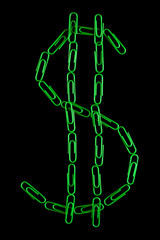 Fototapeta premium Paperclips arranged into the shape of the dollar sign.