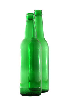 Two Green beer boottles isolated on white