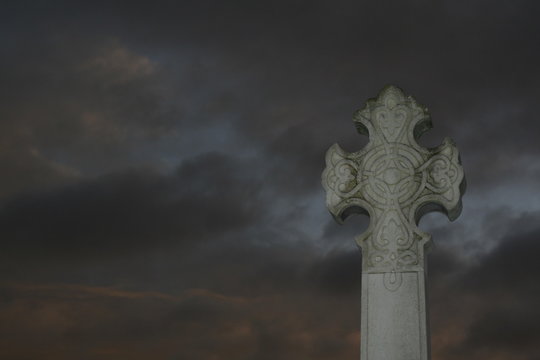 Memorial Cross and Moody Sky