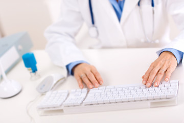 Doctor using computer