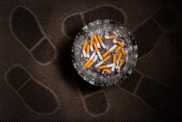 ashtray full of cigarette butts