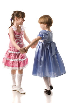 two little girls holding hands