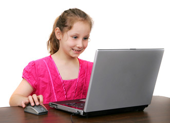 young girl at computer over white