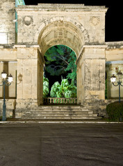 Arch of old British palace by night at Corfu island, Greece