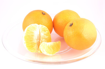 Tangerines in plate isolated