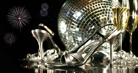 Silver party shoes with champagne glasses