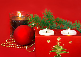 Candle and red decoration