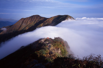Sea of clouds fell in torrents.
