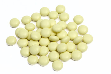 yellow tablets with a jar