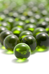 macro of green capsule pills