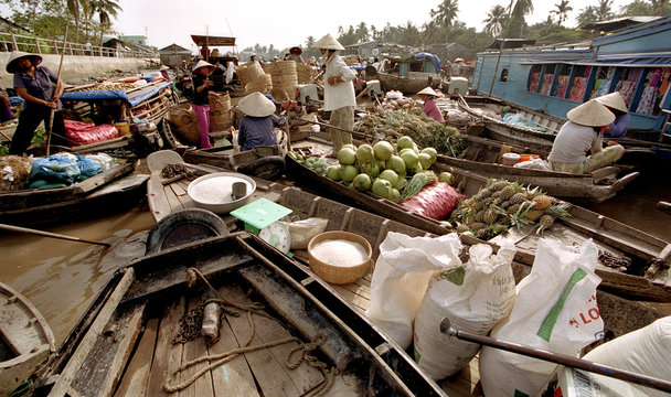 Sellers In A Floating Market. Mekong Delta, Vietnam.