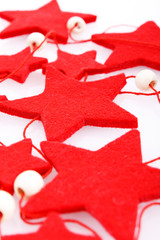 felt holiday red stars isolated on the white