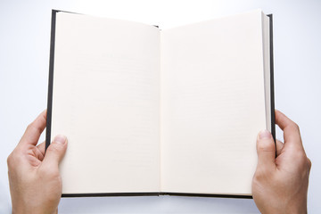 Hand holding book