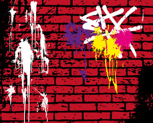 Brickwall with graffiti on it
