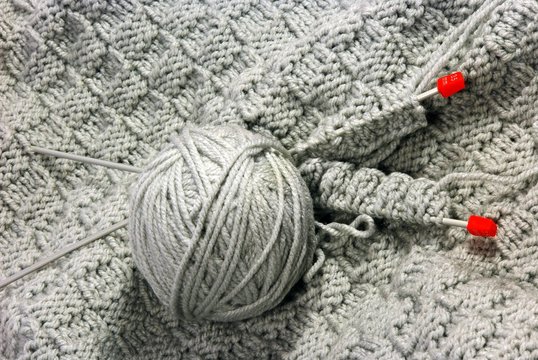 Gray knitting with needles