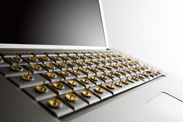 notebook computer keyboard with nails