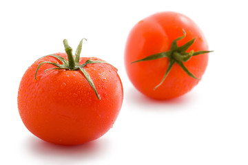 two ripe tomatoes isolated