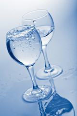 water splashing into glass