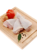 Raw chicken legs isolated on white background