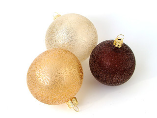 three christmas balls isolated on white