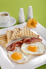 Breakfast - toasts, eggs, bacon