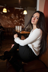 Beautiful woman sitting in cafe