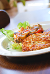 mix of grilled vegetables, steak and salad leaf