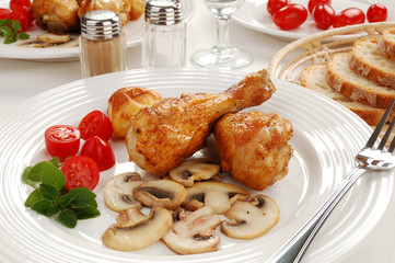 Roasted chicken legs with vegetables