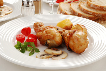Roasted chicken legs with vegetables
