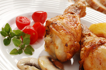 Roasted chicken legs with vegetables
