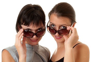 Two smiling women with glasses